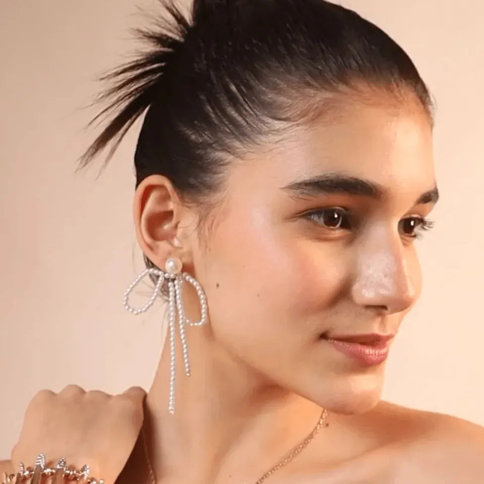 TFC Bow Pearl Gold Plated Stud Earrings