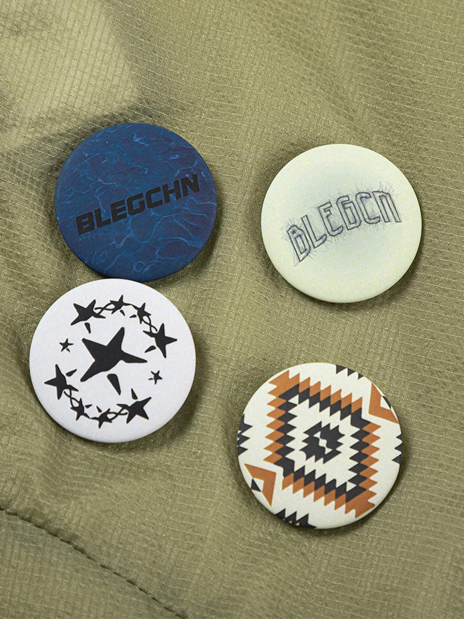 Thesupermade Badge-embellished Stand Collar Half-zip Hoodie